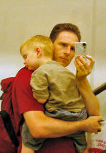 Martin and Alex, on the escalator in Boots on Princes St. Edinburgh