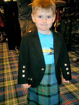 Alex getting fitted for a kilt